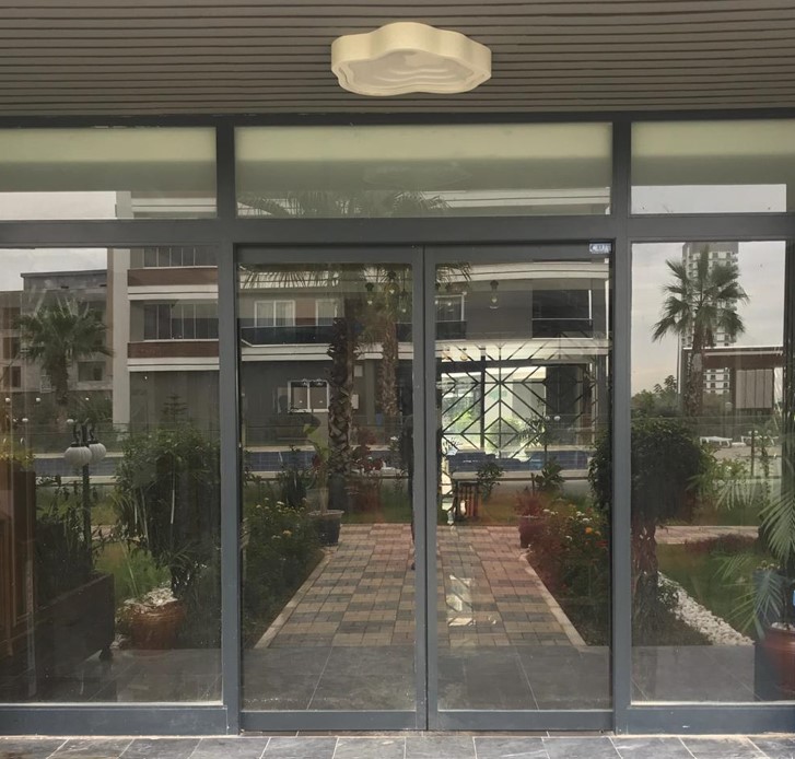 Automatic sliding glass door systems